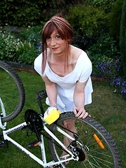Sweet Lucimay gets very soapy as she cleans her bike
