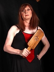 Horny Lucimay loves to give a stern spanking out with her wooden paddle.