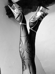 Something very different with a black and white photoset where I am wearing a lace bodystocking and spike heels which all goes to make for a very dram